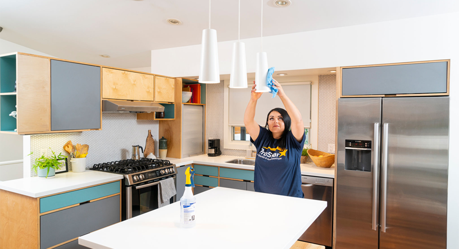 Cleaning a kitchen light fixture